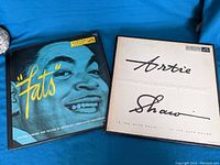 Front covers of the 'Fats' box set and 'Artie Shaw' box set vinyl records.