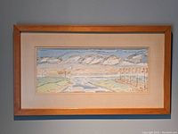 Framed watercolour landscape painting showing full artwork and frame.