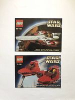 Front covers of both instruction manuals for the LEGO Star Wars Jedi Starfighter (set 7143) and Twin-Pod Cloud Car (set 7119).