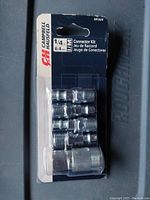 Front view of sealed Campbell Hausfeld MP2920 1/4 in air connector kit showing connectors inside blister packaging.