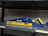 Irwin Universal Hand Saw on metal shelf, showing side of packaging and handle
