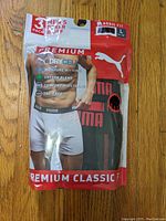 Front packaging of Puma 3-pack men's boxer briefs showing branding, features, and packaging condition.