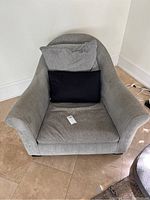 Front view of gray Montauk chair showing cushions and seat area