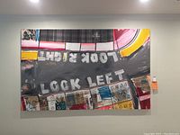 Full view of the original painting by Brent Ray Fraser, displaying 'LOCK LEFT' and 'LOOK RIGHT' text and mixed media collage details.