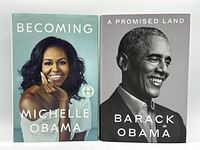 Front covers of two books: "Becoming" by Michelle Obama and "A Promised Land" by Barack Obama.