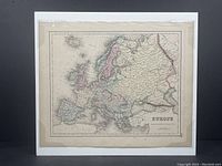 Full view of the entire antique hand-coloured map of Europe mounted on foam-board and shrink-wrapped for protection.