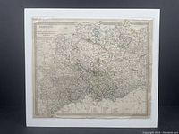 Full image of the antique map on foam board showing entire map area with visible color borders and text.