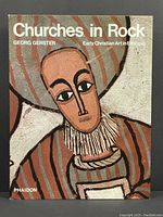 Front cover showing stylized Ethiopian Christian art figures with the title and author.