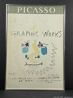Full front view of framed lithograph poster showing header, motif and framing