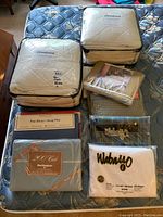 Overview of all bedding items on mattress, including blankets, sheets and shams