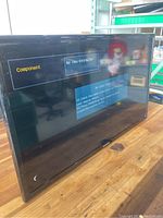 Samsung 32 inch TV powered on displaying 'No Time Information' and 'No Cable Connected' message on screen.