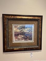 Frontal view of framed print on wall