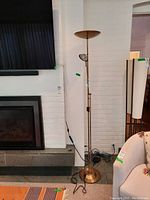 Full-height view of lamp showing torchiere shade top and reading lamp