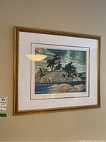 Frontal view of the framed print hung on the wall