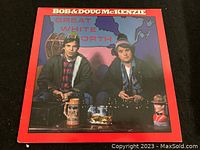 Front cover of Bob & Doug McKenzie's "The Great White North" album featuring the iconic red border and image of the two characters in winter clothing.