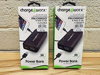 Front view of two boxed ChargeWorx power banks, showing brand, capacity, and packaging details.