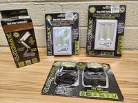 Photo showing full lot of three Glow Max LED light products in packaging displaying product type and technology.
