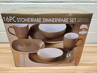 Box of 16 piece stoneware dinnerware set with service for 4, showing front of packaging with images of the dishes.