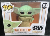 Front view of boxed Funko Pop figure of The Child from Star Wars The Mandalorian, number 368, showing figure inside and packaging details.