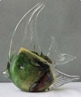 Side view of the Murano glass multicolor fish figurine showing clear fins and multicolor body.