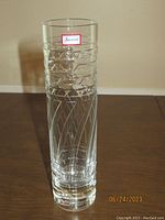 Front view of Baccarat crystal vase showing etched geometric pattern and label