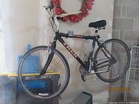 Full left side view of the bicycle showing frame, wheels, drivetrain and seat