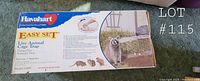 Box front showing Havahart branding and description of live animal cage trap used to trap animals safely and humanely.