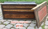 Antique hand dovetailed wooden tool chest with lid removed showing compartment drawers.