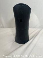 Black AirWick AutoFresh automatic air freshener dispenser front view showing dispenser body.