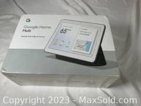 Front of Google Home Hub retail box showing the product image and branding