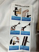 Instruction guide for microphone stand and accessory installation with step-by-step images.