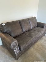 Front three-quarter view of sofa showing full body