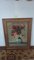 Full frontal photo of the framed floral watercolor painting showing details of flowers and frame.