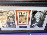 Full view of framed artwork showing TIME magazine cover, photos of Einstein, and autograph plaque