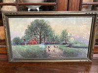 Full view of the framed watercolor painting depicting rural landscape
