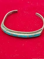 Top angle view of the vintage turquoise bracelet showing the turquoise inlays and twisted silver rope detail.