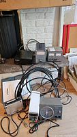Overview of all controllers, power supplies, coaxial load resistor, coax switch and cables on tabletop
