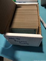 Box containing a large set of hockey cards labeled '1990-91 Bowman Hockey'.
