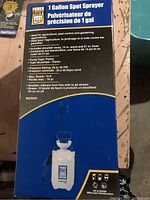 Box showing Power Fist 1 Gallon Spot Sprayer with features and specifications.