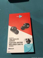 Front of retail box showing BlueBuds true wireless earbuds in black, Bluetooth logo, and Blue Hive branding.