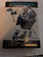 Front of a Parkhurst You Crash The Game insert hockey card featuring Stephan Lebeau in a Mighty Ducks of Anaheim uniform.