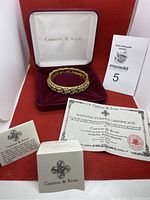 Bangle in original Camrose & Kross box with certificate of authenticity and packaging shown