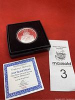 2014 Silver Shield silver proof medallion in black box with certificate of authenticity and auction tag.