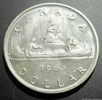 Obverse side showing two men in a canoe and 'CANADA DOLLAR 1960'