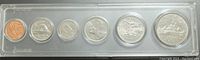 Front sides of six 1968 Canadian coins in a clear plastic holder showing Queen Elizabeth II portraits.