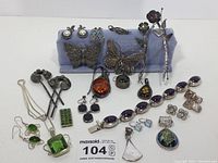 Overview of all pieces on display stand