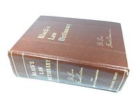 Front angled view of the complete book showing title and author on front cover and spine.
