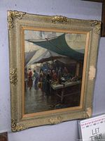 Full view of the painted canvas in its ornate frame showing market scene under canopies and figures standing at tables with vegetables.