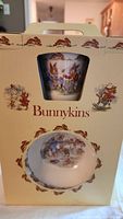 Front view of original packaging showing ceramic mug and cereal bowl inside with Bunnykins bunnies illustrations