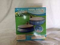 Photo of Summer Escapes pool cover box showing the cover fitting on 15 ft frame and 16 ft ring pools with a visual of the cover and product label.
